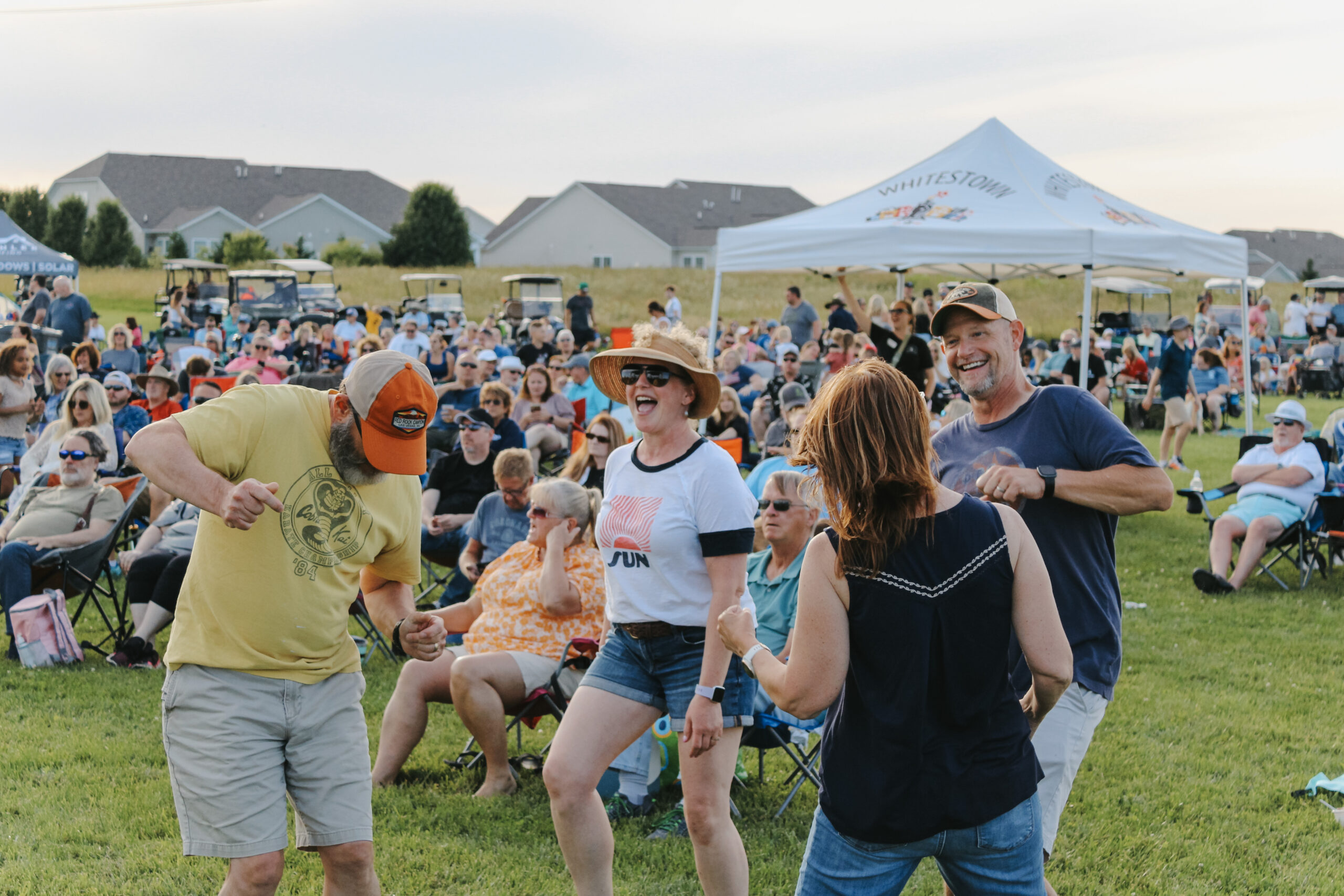 Group of people dancing at the Summer Concert Series